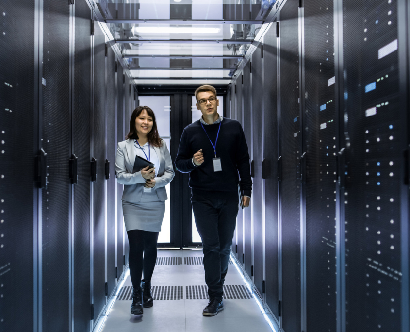 People In Data Center Discussing Work