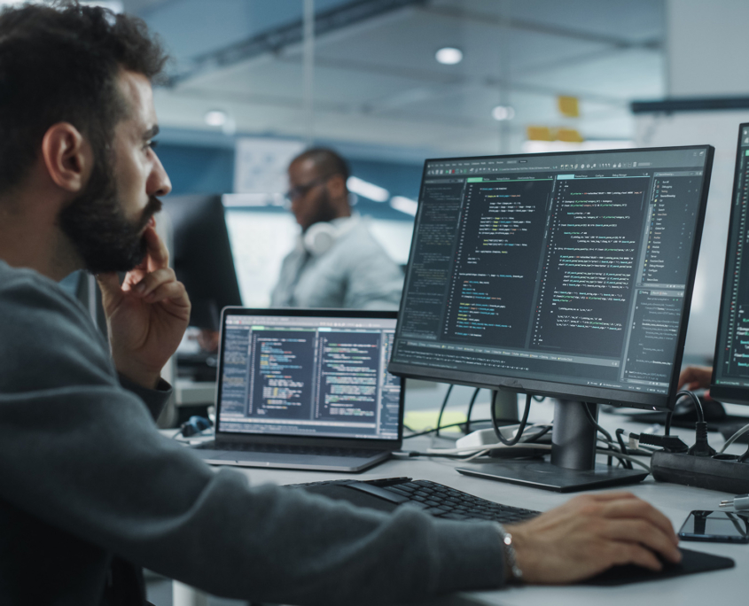 It Workers On Computer In Office 470107451