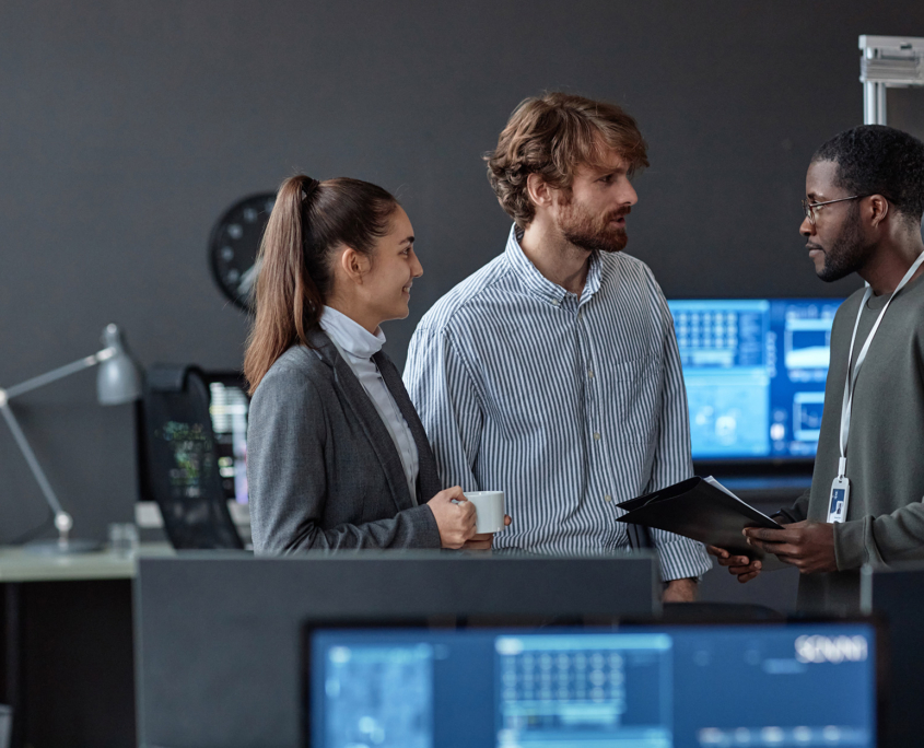 It Workers On Computer In Office 729570110